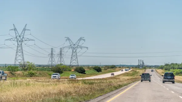 Highway road 84 near Snyder, Texas countryside with cars in traffic and power lines cables.