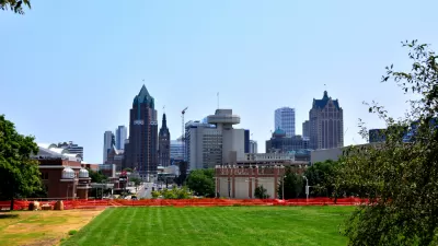 View of green grass lawn and downtown Milwaukee skyline