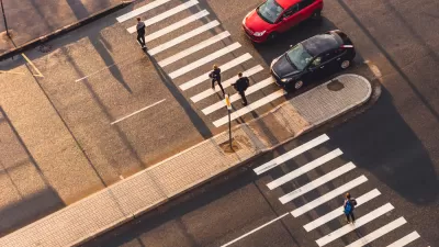 Overhead view of crosswalk with pedestrian median
