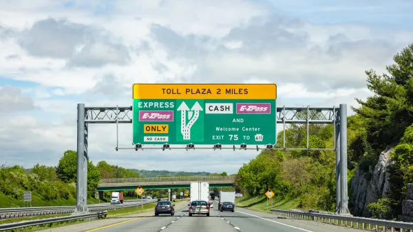 Green freeway toll sign.