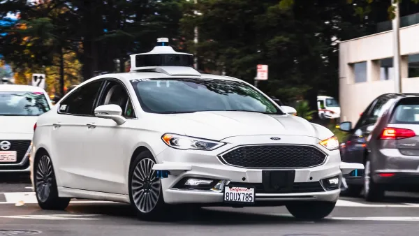 White Lyft self-driving car on San Francisco street.