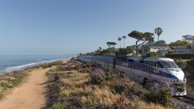 Amtrak train on track by the beach in Souhern California