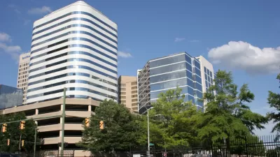 Richmond skyline with multistory parking garage and office buildings.