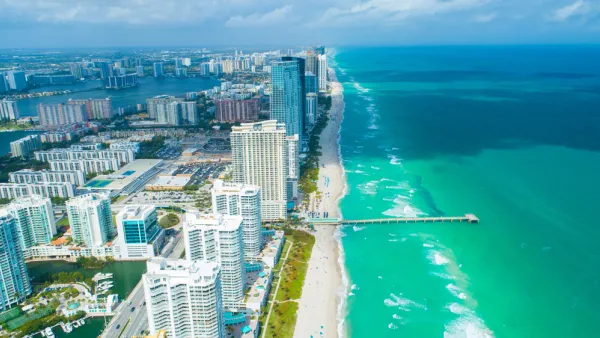 Aerial view of high-rise condominium buildings on beach in Miami, Florida
