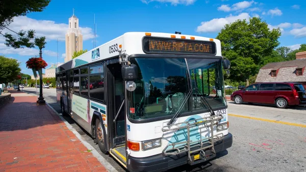 White Pawtucket RIPTA Bus on Roosevelt Avenue in downtown Pawtucket, Rhode Island