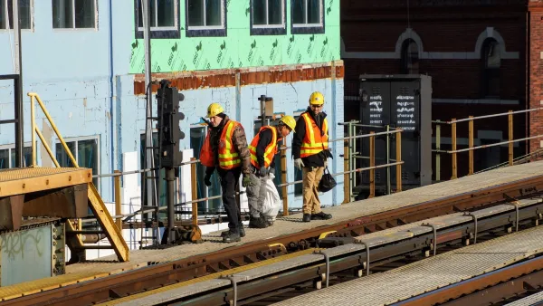 NYC MTA Subway Track Inspectors Working on an Elevated Platform Track.