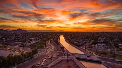 Sunset view over canal and downtown Scottsdale, Arizona