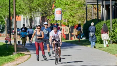 People biking and rollerblading on Atlanta BeltLine trail