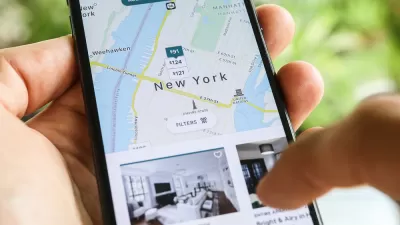 Close-up of phone with Airbnb map of New York