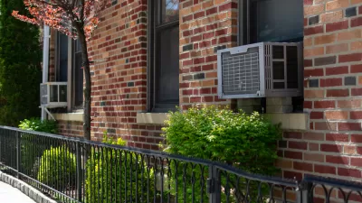 Window air conditioner units on a brick building