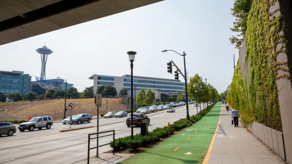 Green painted and protected bike lane in Seattle, Washington.