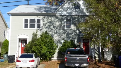 Wooden duplex home with two driveways in Arlington, Virginia