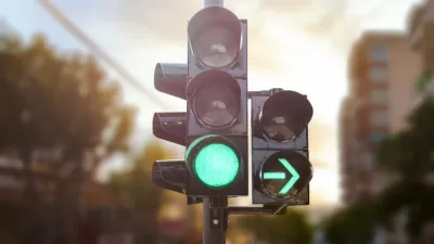 Traffic light with green light on and green right turn arrow on