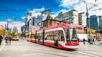 Red and white Toronto streetcar