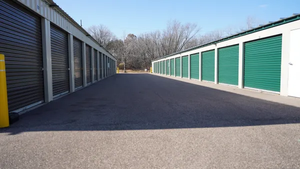 self storage facility with green doors.