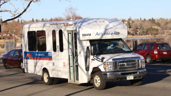 White Denver RTD on-demand microtransit van on street.