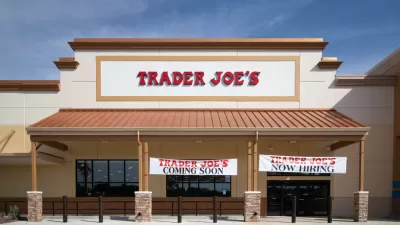 Trader Joe's building with "Coming Soon" and "Now Hiring" banners