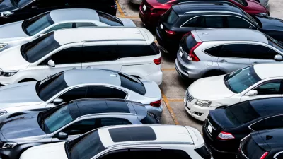 Outdoor parking lot full of cars