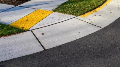 Curb cut at corer of sidewalk