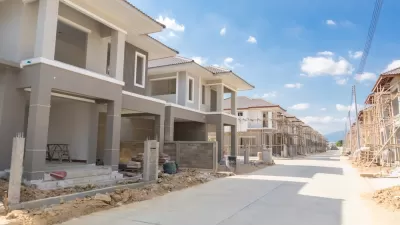 Gray houses under construction