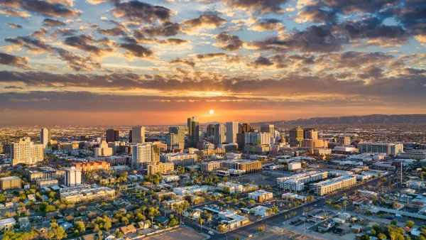 Phoenix, Arizona skyline against the sunset.
