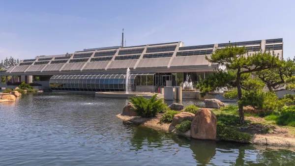 Tillman water reclamation facility in Van Nuys, California with Japanese garden surrounding glass modernist building.