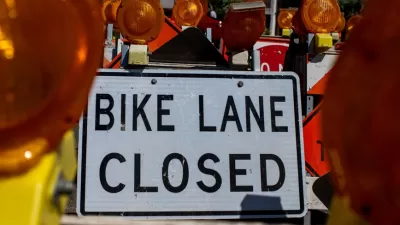 Close-up of "Bike Lane Closed" sign