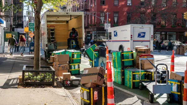 Workers sort Amazon deliveries for distribution in the Greenwich Village neighborhood of New York.