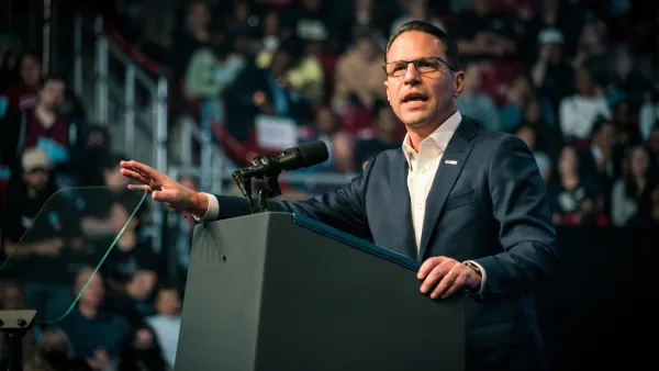 Pennsylvania GOvernor Josh Shapiro speaking at a podium.