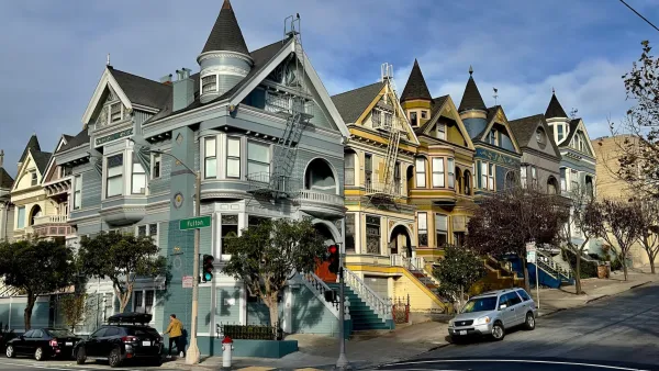 Ornate Victorian homes with turrets and rounded windows in San Francisco, California.