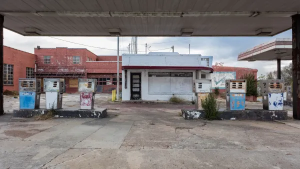 Abandoned, boarded up small vintage gas station in rural Georgia.