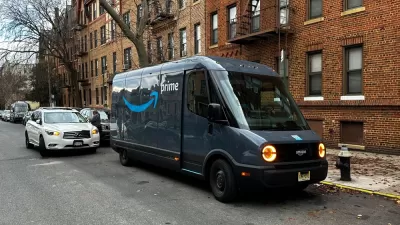 Rivian electric Amazon delivery van delivering packages curbside on New York City street