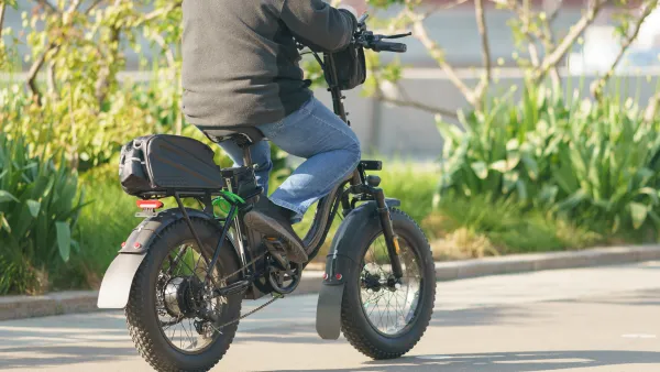 A person riding an ebike in a park