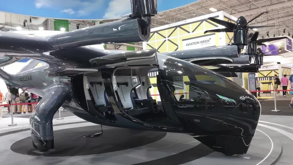 Black Archer Aviation autonomous air taxi at trade show.