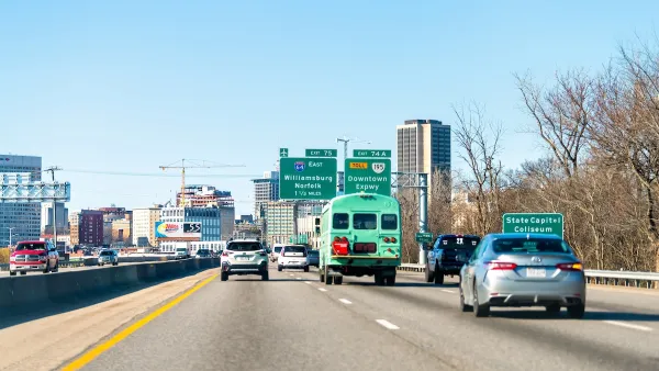 A busy highway in Richmond, with construction and the city visible in the background.