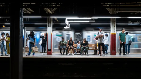 People on a New York City subway platform.