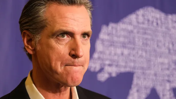 Close-up of California Governor Gavin Newsom against purple backdrop with bear sillhouette.
