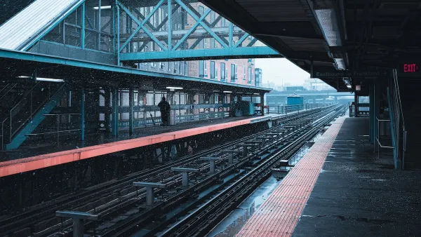Empty train platform in Philadelphia, Pennsylvania with snow falling.