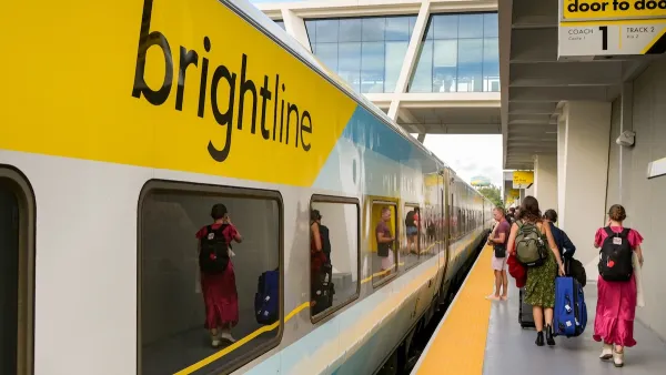 People board a bright line Florida train. 
