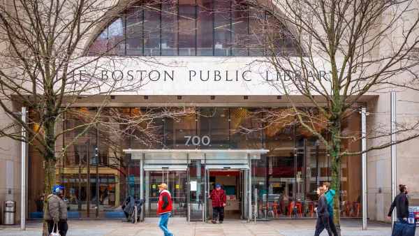 Facade of Boston Public Library branch with title etched in stone above doorway.