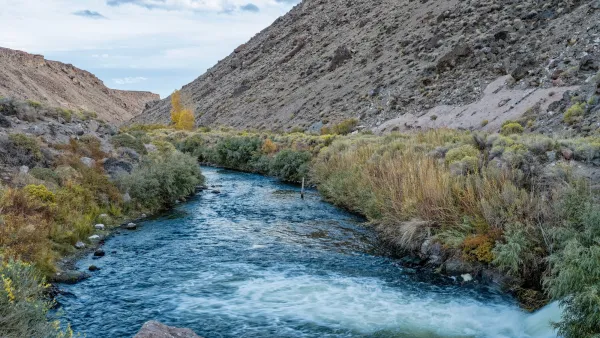 Owens Owens River in Bishop, California with water spilling in from Pleasant Valley Dam.