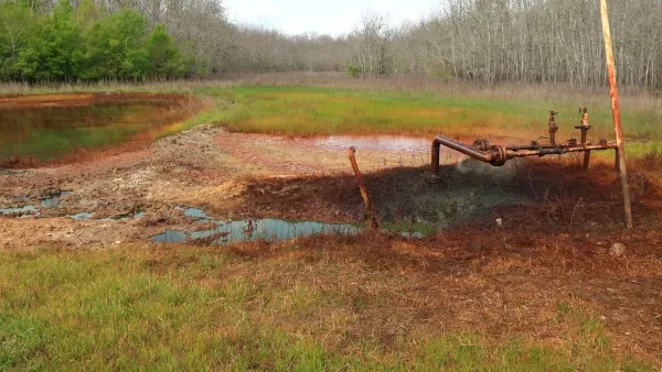 A leaking oil well in Texas contaminates a field.