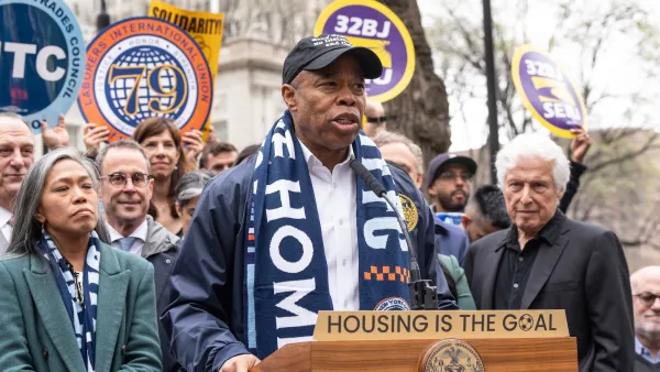 New York City Mayor Eric Adams speaking at an outdoor lectern.
