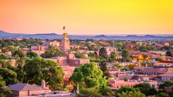 Cityscape of Santa Fe, New Mexico at dusk.