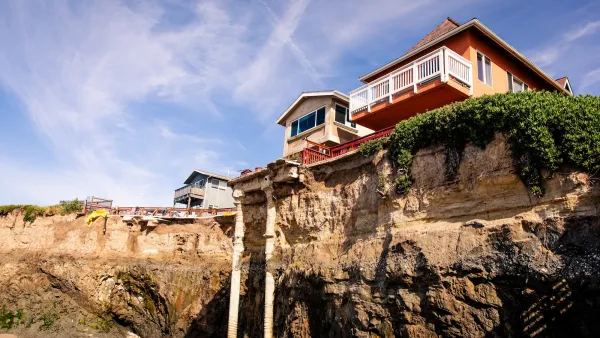 Home perched on steep cliff almost falling due to erosion.