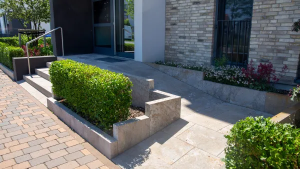 A wheelchair ramp provides access to a building.