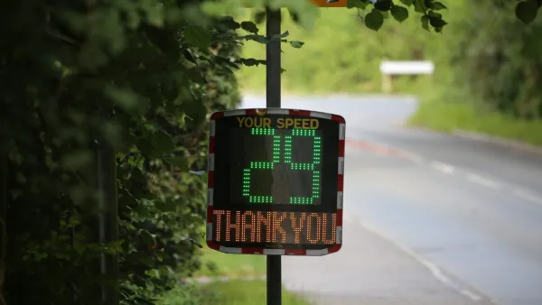 Electronic sign on roadside with 29 in green and Thank You in yellow below it.