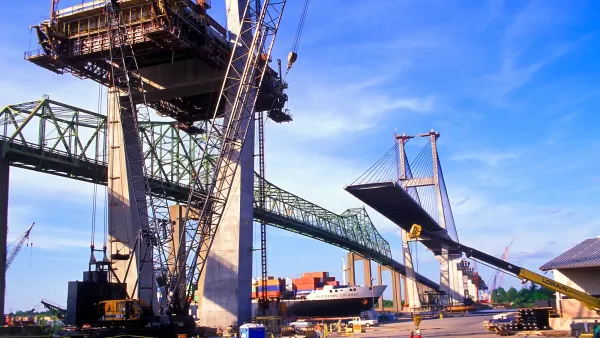 Tall bridge or overpass under construction.