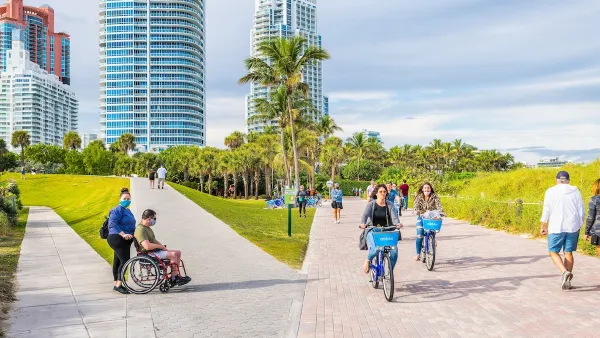 People bike and jog through a park in Florida.