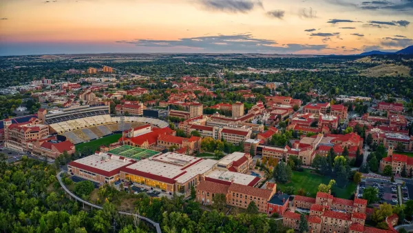 Serial view of large unversity campus in Boulder, Colorado at dusk.